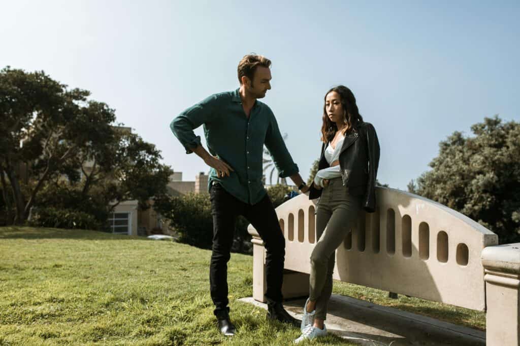 couple talking outside in park